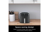 Ninja air fryer on a kitchen counter with text highlighting space-saving design