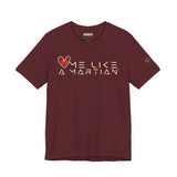 Maroon t-shirt with 'Love Me Like a Martian' text and heart design on a white background