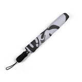 Black and white patterned umbrella on a white background