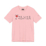 Pink t-shirt with 'Love Me Like a Martian' text and logo on a white background
