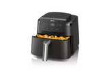 Black Ninja air fryer with food inside on a white background