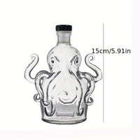 Clear glass bottle shaped like an octopus with a black cap, shown with a measurement label on a white background.