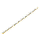 Gold bracelet with diamonds on a white background